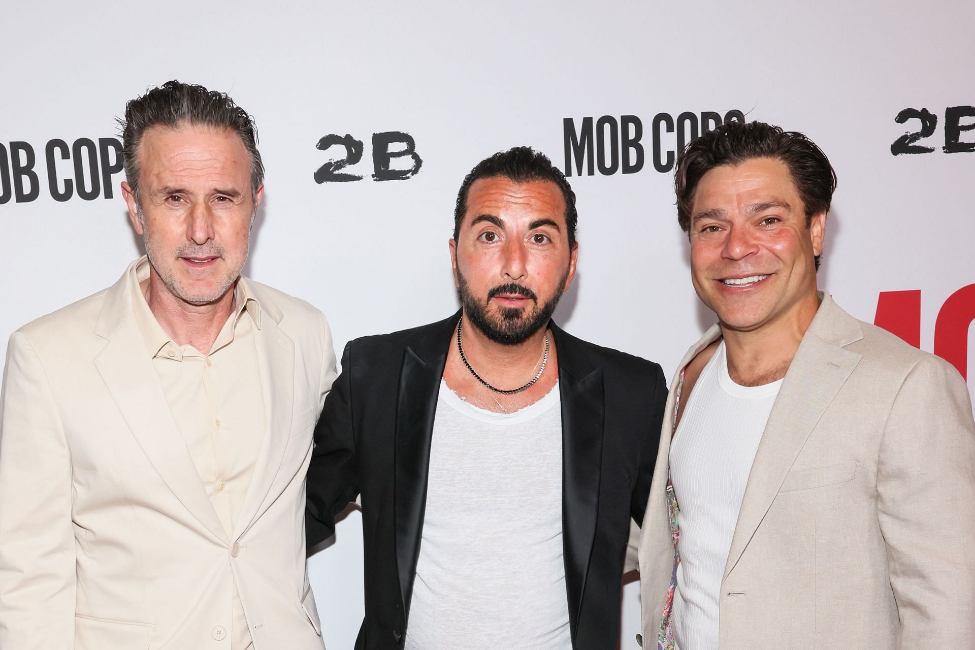 David Arquette, Danny A. Abeckaser, and Jeremy Luke attend the Los Angeles screening of "Mob Cops" at Harmony Gold on April 23, 2025, in Los Angeles, California. (Image via Getty)